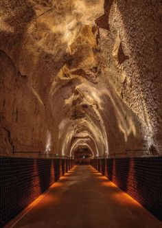 a long tunnel with lights in the middle