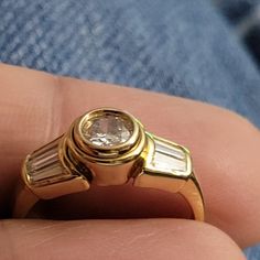 18k Solid Yellow Gold Ring With Genuine Mined Diamonds. Size 6 Center Stone Is About The Size Of 1/2 Ct Diamond. Baggett Diamonds On Each Side. Diamonds Are Very Good Quality To The Naked Eye. Unknown Color And Clarity. This Ring Is Very Beautiful! Well Made! If You Don't Like Prongs, This Is The Ring For You! Wear Without Worries Of Damage To Your Nice Sweaters Or Grab Into Things! 90s Gold Rings, Nice Sweaters, Yellow Gold Ring, Cool Sweaters, Solid Yellow, Yellow Gold Rings, Womens Jewelry Rings, Good Quality, Gold Ring