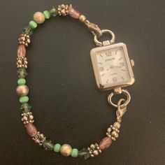 Pretty Bracelet Watch. Pink, Green, Silver Beads . Has Stretch.See All Photos. Square Face. Quartz Movement. Brand New Battery In July ! Connects On Both Sides For Easy On And Off. I’m A 7 In Wrist, This Is Big On Me. It’s For A 7.5-8 Wrist. Big Beaded Jewelry, Big Beaded Bracelets, Beaded Watches Bracelet, Beaded Watches, Watch Jewelry, Native American Crafts, Square Face, Old Watches, Pretty Bracelets