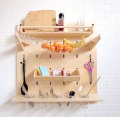 a shelf that has some utensils on it