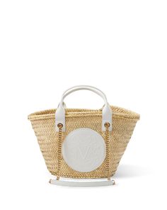 A classic as seen through the VB lens, the small Crest Market tote will always be in style. Made from straw handwoven in Spain, the roomy silhouette is well-sized for a day at the beach or for running errands around town. The leather patch detail is embossed with the brand crest while gold chain shoulder straps and a smooth leather top handle finish the look. Its neutral body keeps styling simple—wear it with anything and everything.17” L x 6” W x 10” H Short strap drop: 4”; long strap drop: 13" Market Tote, Veronica Beard, Leather Patches, Leather Top, Smooth Leather, Running Errands, Gold Chain, Shoulder Straps, Top Handle