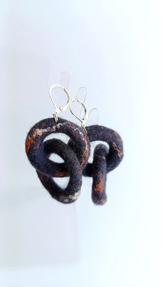 Felted dark gray dangling earrings!    Do you have felt earrings in your jewelry collection? Or maybe you are looking for an original gift for a loved one, girlfriends for a bachelorette party or colleagues? And you want to pleasantly surprise them with something new and exclusive!    I offer handmade earrings of my own design! They are made by me in my own way, which includes both dry felting and wet felting. And I also used incredibly soft natural sheep's wool and valuable plant fibers, such a Needle Felted Earrings, Felt Earrings, Felted Jewelry, Dry Felting, Felted Earrings, Earrings Chain, Chunky Earrings, Felt Jewelry, Metal Accessories