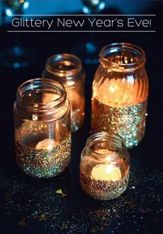 three jars filled with glitter next to each other