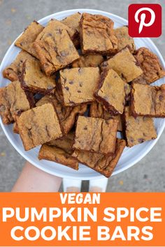 vegan pumpkin spice cookie bars on a white plate with text overlay that reads vegan pumpkin spice cookie bars