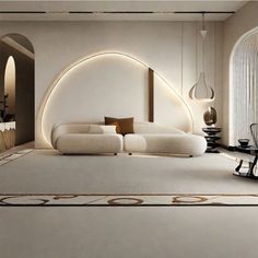 a living room filled with white furniture and lots of mirrors on the wall above it