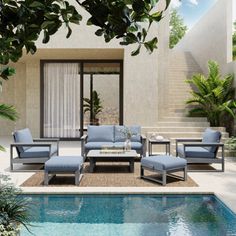 an outdoor living area with pool and patio furniture