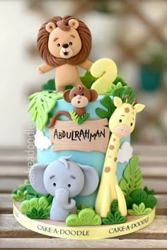 there is a cake that has animals on it