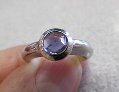 USA SHIPPING ONLY          AUTHENTIC    Tiffany & Company 18k  White Gold Iolite Ring size 5-1/2   Make Offer, Excellent condition,   Fully signed and 100% guaranteed authentic,  8 mm wide,  5.5 mm bezel set top faceted cabochon cut gem Iolite  apx. .50 ctw set in  8 grams signed 18k white gold,  Feels great on your finger too!      Appraised at $1,995.00          Make Offer     BID WITH CONFIDENCE KNOWING WE ARE A 25+ YEAR  WITH NEAR PERFECT FEEDBACK.  FREE SHIPPING     PLEASE CLICK ON OUR STORES ICON BANNER BY MY NAME TO SEE THOUSANDS OF OTHER ITEMS THAT ARE NOT IN AUCTION. I AM A GRADUATE GEMOLOGIST SCHOOLED AT THE G.I.A. AS WELL AS A CURRENT MEMBER OF THE A.N.A. & N.A.J.A. SO BE ASSURED YOU ARE GETTING AN ACCURATE EVALUATION. PLEASE UNDERSTAND, IF YOU ARE THE HIGH BIDDER WHEN THIS AUCT Tiffany And Co Earrings, Tiffany And Co Bracelet, Tiffany And Co Jewelry, Tiffany And Co Necklace, Antique Jewelry Rings, Family Jewels, Tiffany And Co, A J, Pandora Jewelry