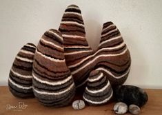 a group of rocks sitting on top of a wooden table