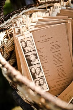 a basket filled with lots of cards and pictures