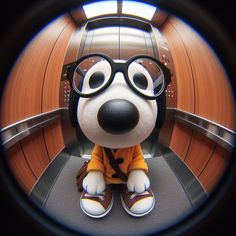 a stuffed animal wearing glasses sitting in front of a mirror