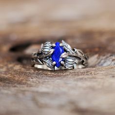 Silver Branches Ring, Lapis Lazuli Ring, 925 Sterling Silver Ring, Leaves Celestial Ring, Blue Gemstone Ring, Weeding Rings, Christmas Gift  SHOP LINK:- https://www.etsy.com/shop/MaaShabashibaJewell?ref=seller-platform-mcnav 》D E T A I L S《 Gemstone: Natural Lapis Lazuli Gem Color: Blue Stone Shape: Marquise Metal: 925 Sterling Silver Purity: 925 Parts Per 1000 Setting Type: Prong Set Silver Polish: High Ring Size: All Size Available Please note that there Can be slight variations in stone texture and color shades in the actual product that you receive. The stone quality or grade will be the same. Because We Use Natural Stones And All Natural Stones Are Not Of Same Textured. All Our Jewelry Is 925 Stamped. Our products are totally handmade and made with high-quality gemstones and sterling Sapphire Sterling Silver Rings Gift, Sapphire Sterling Silver Crystal Ring For Wedding, Sapphire Rings Stamped 925 As Gifts, Sapphire Ring Stamped 925 As A Gift, Sapphire Crystal Ring In Sterling Silver For Anniversary, Blue Sterling Silver Cluster Ring For Wedding, Sapphire Sterling Silver Wedding Ring, Sapphire Cluster Ring In Sterling Silver For Wedding, Sapphire Wedding Rings Stamped 925