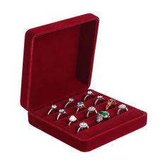 six rings in a velvet box with red velvet lining and matching case for each ring