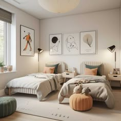 a bedroom with two twin beds and pictures on the wall above them in neutral colors