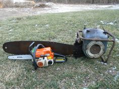 a chainsaw and other tools sitting on the grass