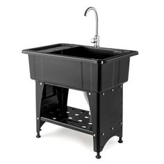 a black sink sitting under a faucet