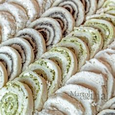 many different types of pastries on display