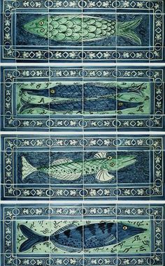 three blue and green tiles with fish on them