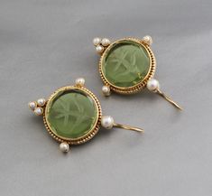 Description Gemstone - Olive Green Glass Material - Brass Gemstone Size - 18 mm Earring Height Including Hoop - 4 cm Earring Width - 2 cm Finish - Smooth and high polished with Little Oxide Antique Look. Note -The earrings are made to order, production day is about 3-5 working days. The one you receive may be slight different from the one in the picture due to handmade nature, but it will be almost same as in the above picture.These pieces are handcrafted from start to finish and have an imperfect handmade look.These earrings are the perfect addition to your collection. Our rings are meant to be classic enough for everyday wear or to give as a bridesmaid gift. You will receive the same piece as in the picture or identical. Since all gemstones are different from each other, I cannot guarant Olive Earrings, Jewlery Rings, Silver Jewlery, Printed Dress Shirts, Cotton Blends Dress, Glass Material, Bridesmaid Gift, Green Glass, Ring Necklace