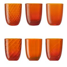 six orange glass cups lined up in a row