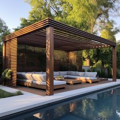 an outdoor living area with couches and a pergolated gazebo next to a swimming pool