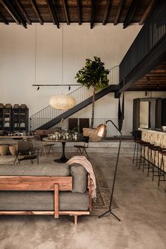 an instagram photo of a living room with couches and tables