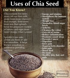 a bowl filled with chia seeds on top of a wooden table