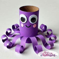 an octopus made out of toilet paper with googly eyes