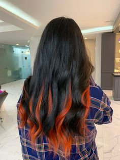 Orange Black Hair Ombre, Black Hair With Orange Peekaboo, Orange And Black Hair Streaks, Red Orange Highlights On Dark Hair, Black Hair With Orange Underneath, Orange Hair With Black Streaks, Red Orange And Black Hair, Dark Hair With Orange Highlights, Peekaboo Hair Color Orange