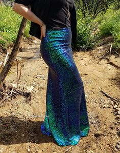 "Hot mermaid alert! This is the coolest looking fabric and looks incredible on every body type. 42 inches is the standard length. Will be work for anyone 5'4\" and wearing heels, up to 5'9\" with flats. - Fully lined, secured with a hidden elastic waistband, stretchy - Great for dinners or events, can be dressed up or down - Returns accepted, but I'm sure you'll feel like a million bucks! Sizes: M - pant size 4 to 8 - stretchy! LAST ONES! Roughly 27-32 waist *Handmade with PRIDE in Southern Cali Blue Fitted Skirt For Cosplay, Fitted Blue Skirt For Cosplay, Blue Stretch Mermaid Dress, Blue Fitted Sequin Skirt, Fitted Blue Sequin Skirt, Blue Fitted Mermaid Skirt, Fitted Blue Bottoms For Costume Party, Fitted Full Length Blue Skirt, Hot Mermaid