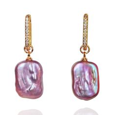 Our Rectangular Pink Baroque Pearl Earrings feature natural, soft pink-purple Baroque pearls directly sourced from farms, ensuring no artificial coloring and preserving their unique beauty. The 925 silver earring posts are hypoallergenic, providing comfort and style. The rectangular pearls bring a modern touch to their timeless elegance, making them perfect for any occasion. For versatility, the pearls can be removed to reveal classic zirconia hoop earrings, offering an effortless way to change Pink Baroque, September Birthstone Jewelry, July Birthstone Jewelry, August Birthstone Jewelry, Baroque Pearl Earrings, Pearl Jewellery Earrings, Earring Posts, Jewelry Ring Box, 925 Silver Earrings