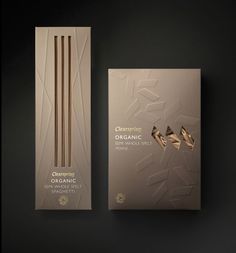 the packaging is designed to look like an organic package with gold foil and brown straws