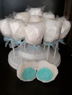 marshmallows are wrapped in plastic and tied with blue ribbon