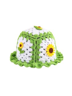 a crocheted hat with sunflowers on it