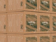 twelve boxes are stacked on top of each other with the words think wine printed on them