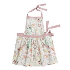 Spare your clothes from kitchen spills and splashes with our apron, featuring muted green ferns, pink flowers and pintuck pleating down the front. Complete with two pockets and soft pink ties at the neck and around the waist, it's as practical as it is adorable. Sewing Ruffles, Jam Making, Smock Apron, Pink Dinnerware, Green Apron, Striped Apron, Cross Back Apron, Floral Apron, Apron Kitchen