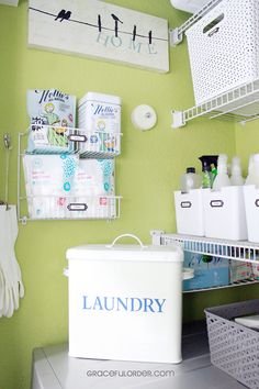 the laundry room is clean and ready to be used as a storage area for personal care items