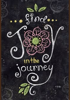 a chalkboard with the words find joy in the journey written on it and an image of a flower