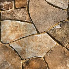 a close up view of a stone wall