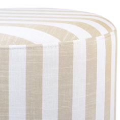 a beige and white striped ottoman