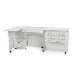 a white desk with shelves and drawers on wheels