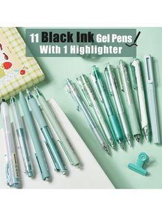 11 black ink gel pens with 1 highlighter in various colors and sizes on a green background