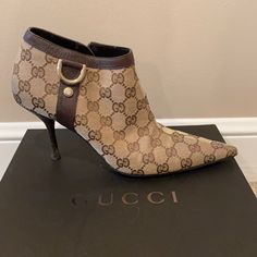 Gucci’s Ankle Bootie Beige Ebony/Cocoa Gucci Leather Ankle Boots, Gucci Elegant Ankle Boots, Gucci Designer Boots With Round Toe, Gucci Brown Ankle Boots, Chic Brown Gucci Boots, Fancy Shoes, Gucci Shoes, Fabulous Shoes, Womens Boots Ankle