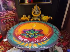 a happy diwali cake with candles on it