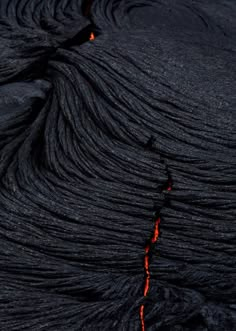 lava flowing down the side of a volcano