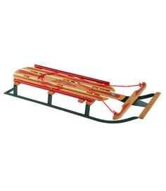 a wooden sled with two people on it