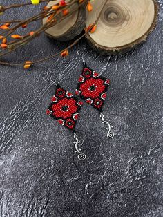 Adjustable Red Flower Beaded Earrings, Unique Red Flower Earrings, Traditional Beaded Pendant Earrings, Red Beaded Flower Earrings, Unique Colorful Beaded Flower Earrings Gift, Unique Colorful Beaded Flower Earrings For Gift, Red Beaded Dangle Flower Earrings, Unique Flower Earrings With Colorful Beads For Gift, Red Flower Dangle Earrings With Colorful Beads