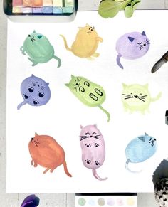 watercolors and crayons are used to create this cute cat sticker sheet