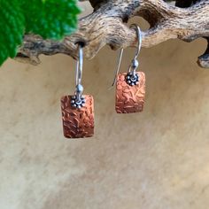 This dainty flower- embossed copper earrings are so sweet! Sterling silver ear wires. Lightweight and lovely. Kimbajul...Kimba Jewelry **To see more earrings click here https://www.etsy.com/shop/Kimbajul/edit?ref=seller-platform-mcnav&section_id=14497822 Handmade Artisan Copper Earrings, Artisan Copper Earrings For Everyday, Copper Earrings Handmade Rustica Jewelry, Copper Smithing, Nature-inspired Copper Earrings As Gift, Ears Ringing, Metal Earrings Handmade, Nature-inspired Silver Copper Earrings