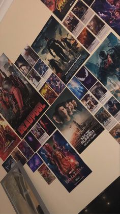 a bunch of movie posters hanging on the wall